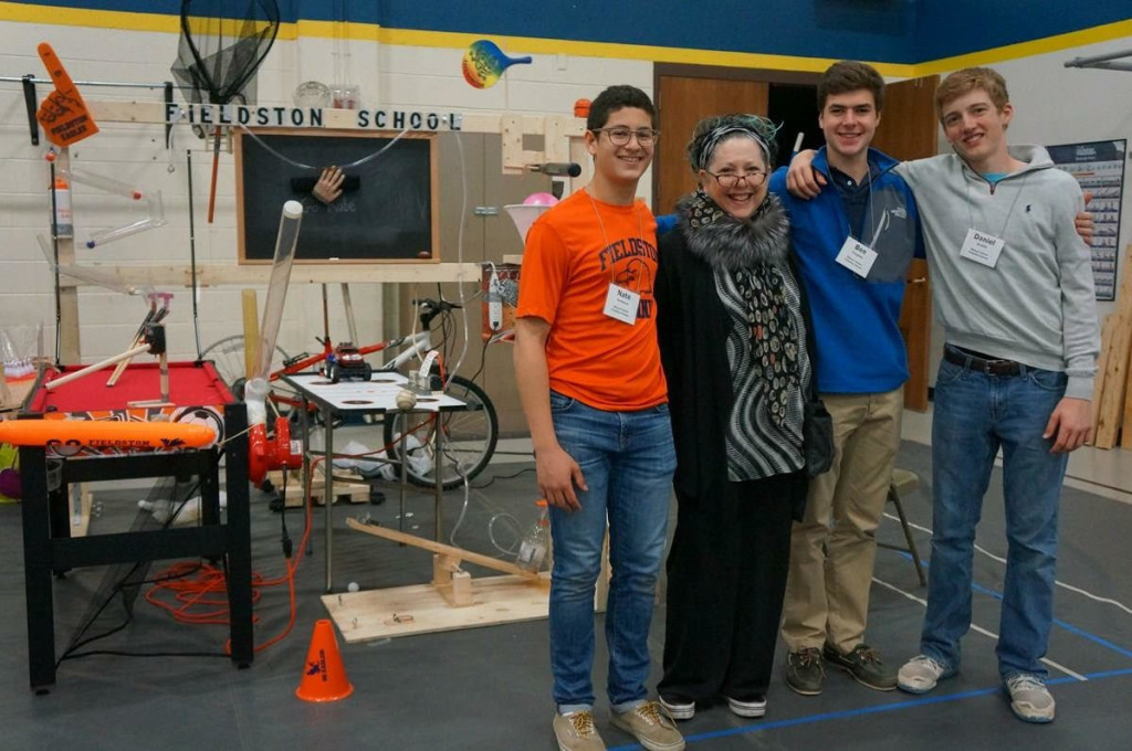 Photo by Ellen Newhouse. The Fieldston team poses in front of their machine with Jennifer George.